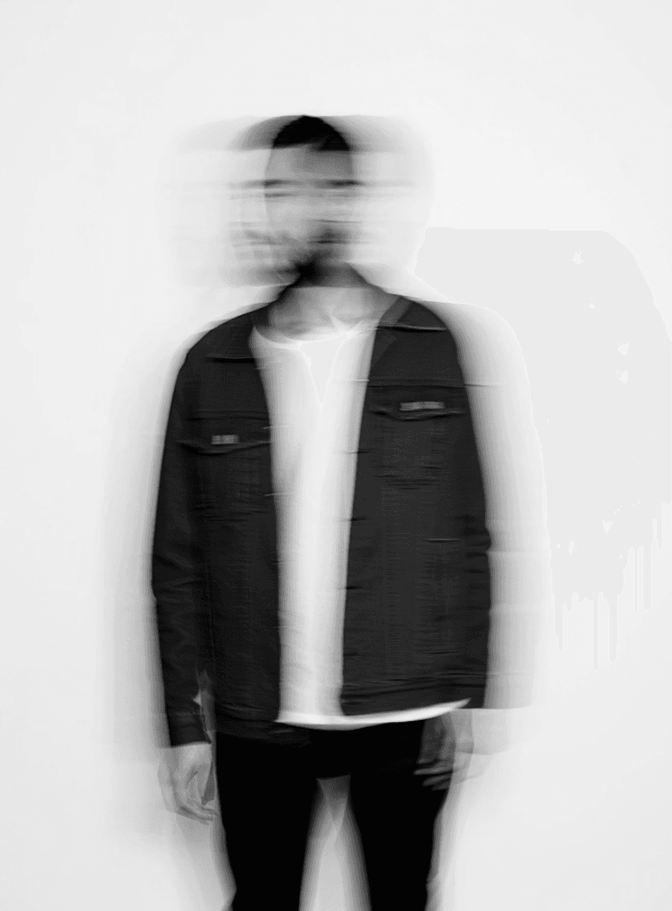 Full-length silhouette of a figure in a long dark coat